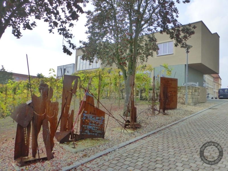 Skulpturengruppe "Merseburger Zaubersprüche" am Tiefen Keller in Merseburg